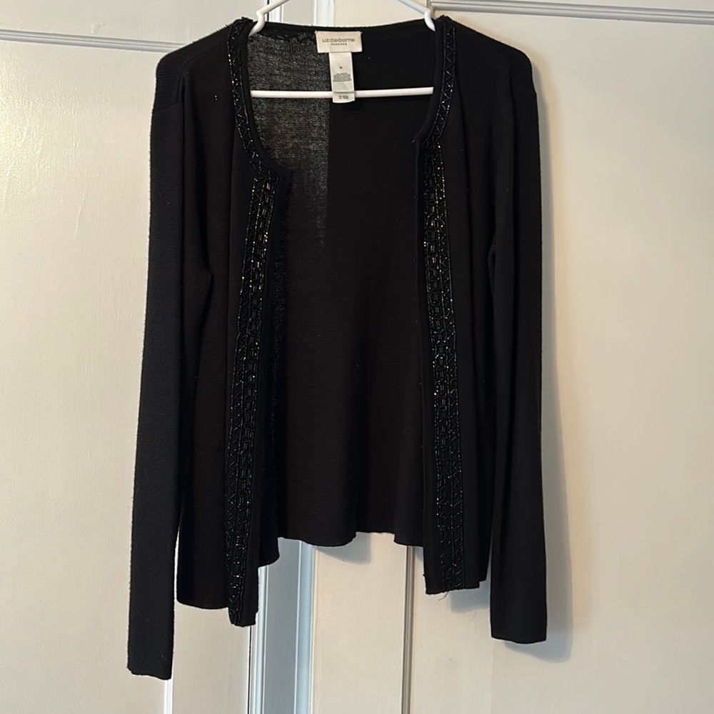 Long sleeve open front embellished cardigan.